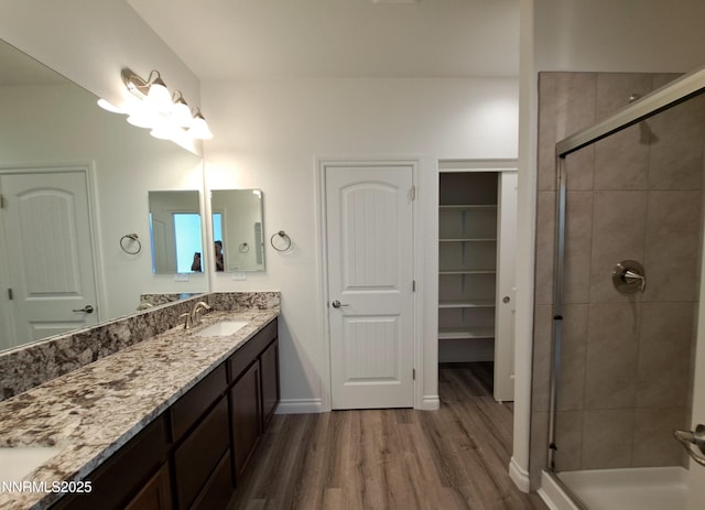 4048 Cold Spgs, Reno, NV 89508 - full bathroom with wood finished floors, vanity, and a stall shower