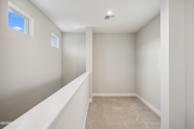 15058 Iron River Dr, Reno, NV 89521 - corridor featuring light colored carpet, baseboards, and recessed lighting
