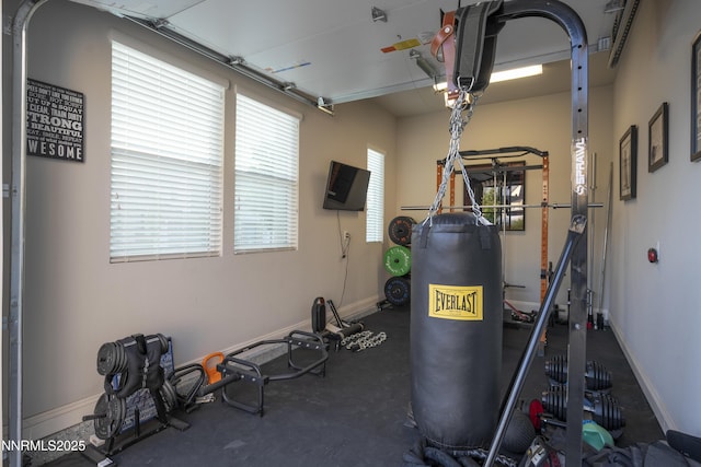 15058 Iron River Dr, Reno, NV 89521 - workout area with a garage and baseboards