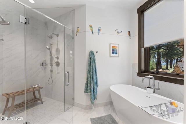 33 Beach Club Dr Unit 506, Stateline, NV 89449 - full bathroom featuring a freestanding bath, marble finish flooring, and a marble finish shower