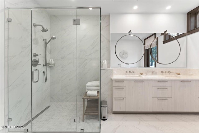 33 Beach Club Dr Unit 506, Stateline, NV 89449 - full bathroom featuring marble finish floors, double vanity, a marble finish shower, and recessed lighting