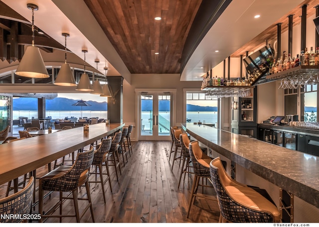 33 Beach Club Dr Unit 506, Stateline, NV 89449 - dining room with a community bar, wood-type flooring, recessed lighting, and wooden ceiling