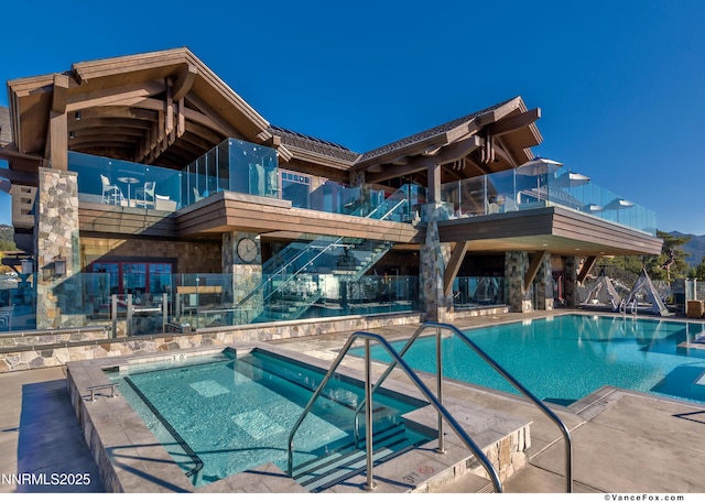 33 Beach Club Dr Unit 506, Stateline, NV 89449 - community pool featuring a community hot tub and a patio