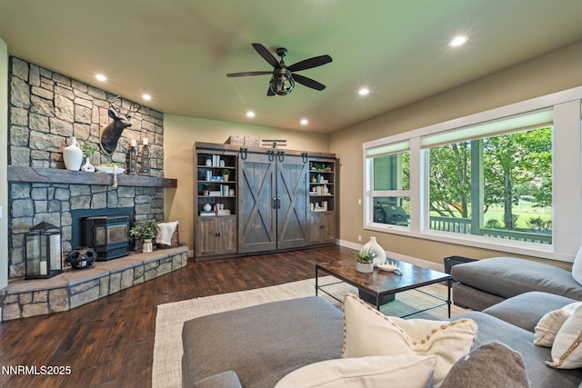 1020 N Cantlon Ln, Reno, NV 89521 - living room with a ceiling fan, wood finished floors, recessed lighting, a barn door, and baseboards