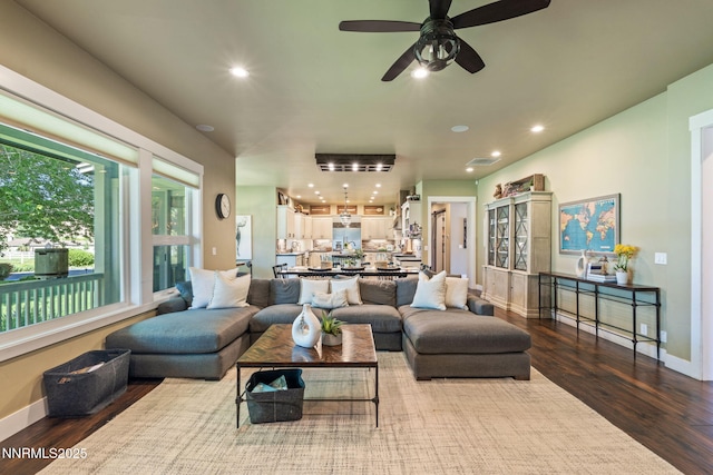 1020 N Cantlon Ln, Reno, NV 89521 - living room with wood finished floors, recessed lighting, baseboards, and ceiling fan