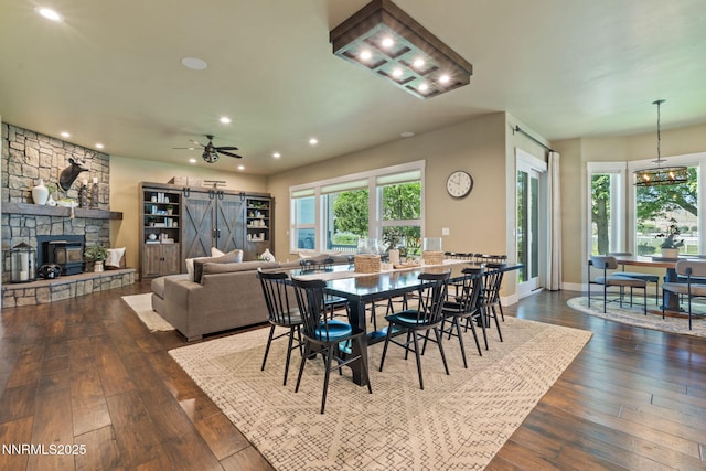 1020 N Cantlon Ln, Reno, NV 89521 - dining room featuring dark wood-style flooring, recessed lighting, ceiling fan, baseboards, and a fireplace