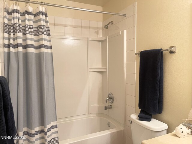555 E Patriot Blvd, Reno, NV 89511 - bathroom with shower / bath combo with shower curtain, toilet, and a textured wall
