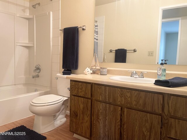 555 E Patriot Blvd, Reno, NV 89511 - full bathroom with vanity, toilet, shower / washtub combination, and wood finished floors
