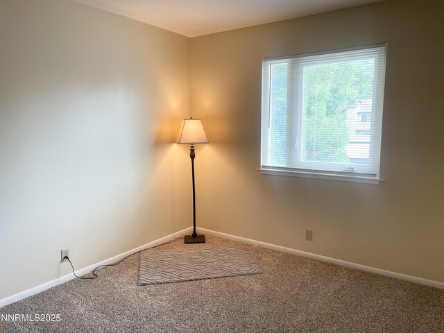 555 E Patriot Blvd, Reno, NV 89511 - detailed view of carpet flooring and baseboards