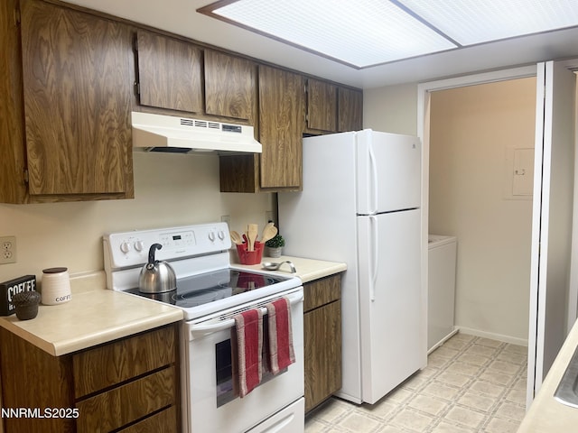 555 E Patriot Blvd, Reno, NV 89511 - kitchen featuring white appliances, under cabinet range hood, light flooring, and light countertops