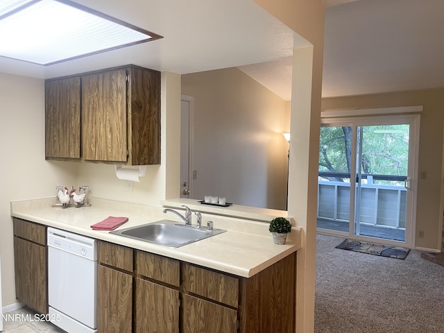 555 E Patriot Blvd, Reno, NV 89511 - kitchen with dishwasher, a sink, light countertops, and light carpet
