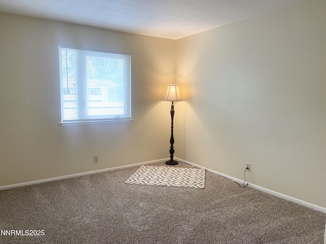 555 E Patriot Blvd, Reno, NV 89511 - carpeted spare room featuring baseboards
