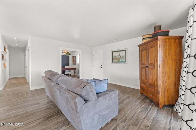 7620 Essex Way, Reno, NV 89506 - living room featuring baseboards, wood finished floors, and recessed lighting