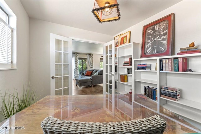 7620 Essex Way, Reno, NV 89506 - sitting room with french doors and wood finished floors