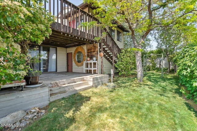 7620 Essex Way, Reno, NV 89506 - view of green lawn with stairs and a deck