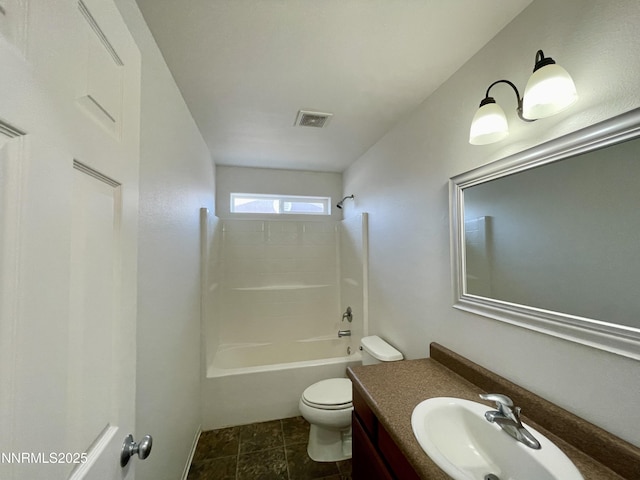 935 Lonnie Ln, Winnemucca, NV 89445 - full bathroom with vanity, toilet, and shower / washtub combination