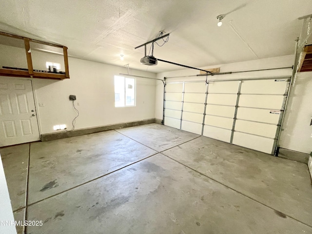 935 Lonnie Ln, Winnemucca, NV 89445 - garage featuring a garage door opener and baseboards