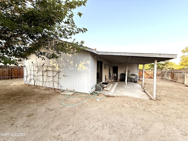 540 Anthony Ln, Fallon, NV 89406 - rear view of property with a fenced backyard and a patio