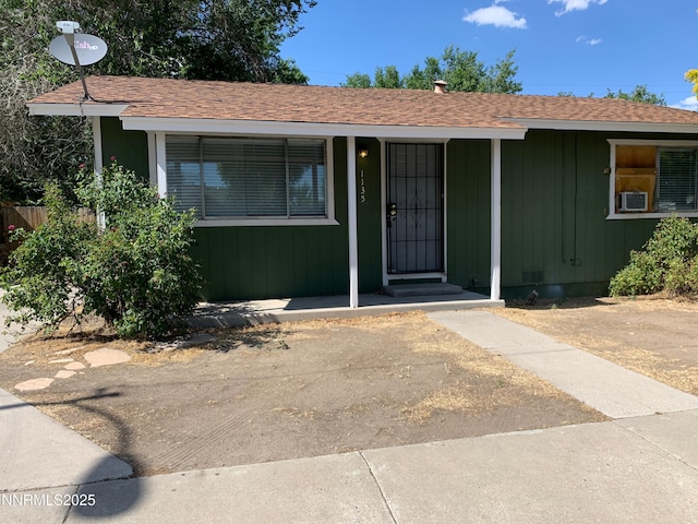 1225 Virbel Ln, Reno, NV 89502 - view of front of house with cooling unit and a shingled roof