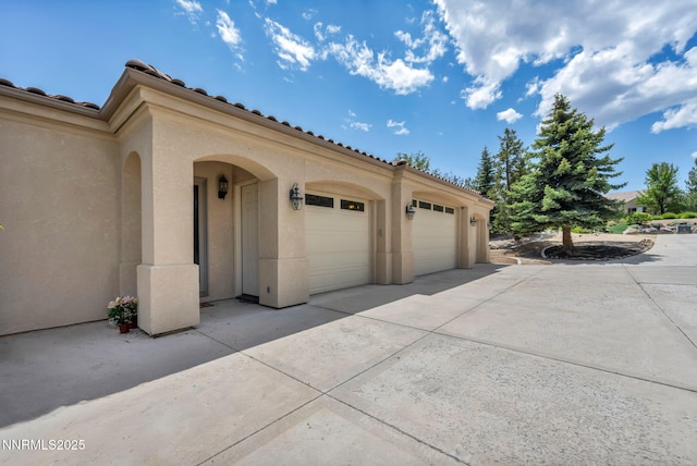 14210 Wild Quail Ct, Reno, NV 89511 - garage with concrete driveway