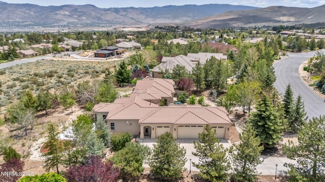 14210 Wild Quail Ct, Reno, NV 89511 - aerial view of residential area featuring a mountainous background