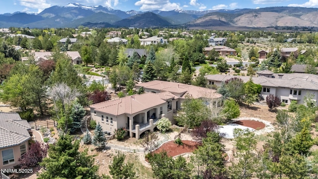 14210 Wild Quail Ct, Reno, NV 89511 - aerial perspective of suburban area featuring a mountainous background
