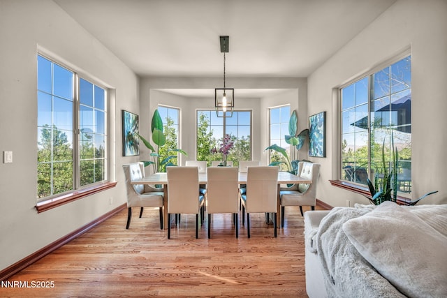 14210 Wild Quail Ct, Reno, NV 89511 - dining area with plenty of natural light and light wood-style floors