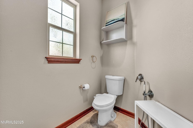 14210 Wild Quail Ct, Reno, NV 89511 - bathroom with toilet and baseboards