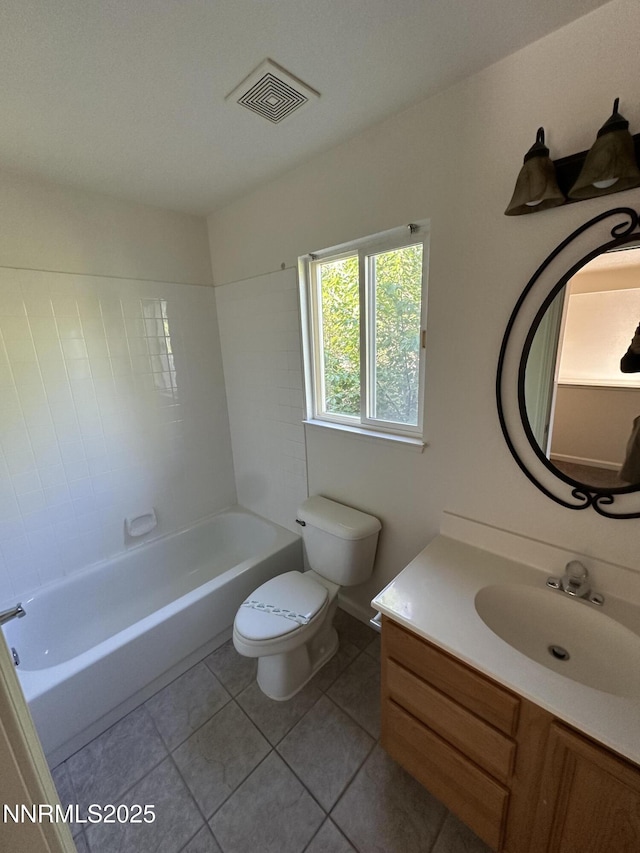4748 Cedarhill Ln, Reno, NV 89519 - full bathroom featuring toilet, vanity, tile patterned floors, and shower / washtub combination