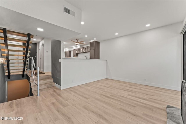 1308 Jones St, Reno, NV 89503 - unfurnished living room featuring stairway, recessed lighting, and light wood-style flooring