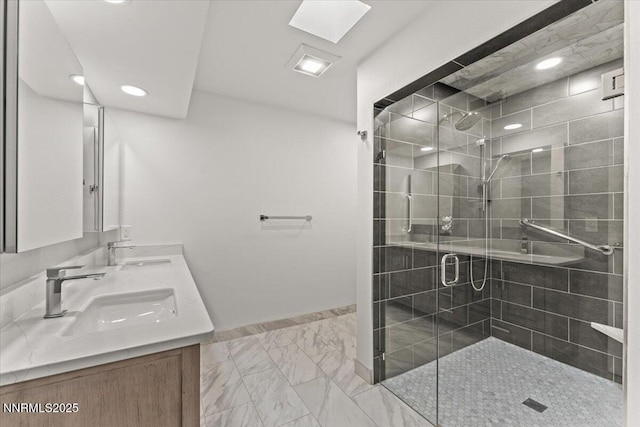 1308 Jones St, Reno, NV 89503 - bathroom with marble look tiles, a stall shower, double vanity, and recessed lighting