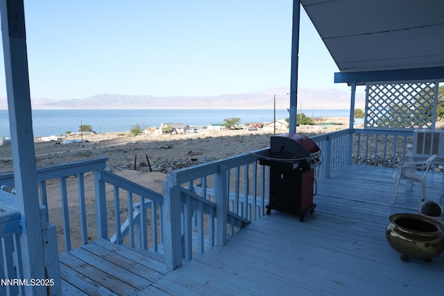461 Debbie Dr, Walker Lake, NV 89415 - deck with area for grilling, a water and mountain view, and central AC unit