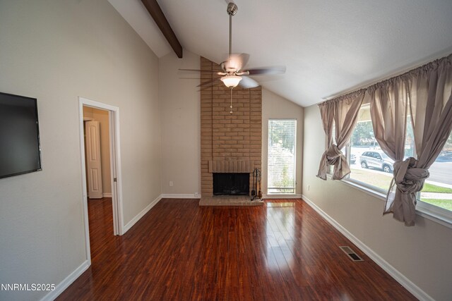1169 Wagon Wheel Cir, Reno, NV 89503 - unfurnished living room featuring ceiling fan, a brick fireplace, wood finished floors, and healthy amount of natural light