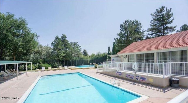 1169 Wagon Wheel Cir, Reno, NV 89503 - community pool with a patio and a community hot tub