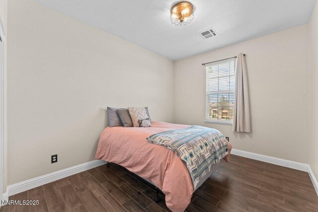 1955 Wind Ranch Rd Unit A, Reno, NV 89521 - bedroom featuring baseboards and wood finished floors