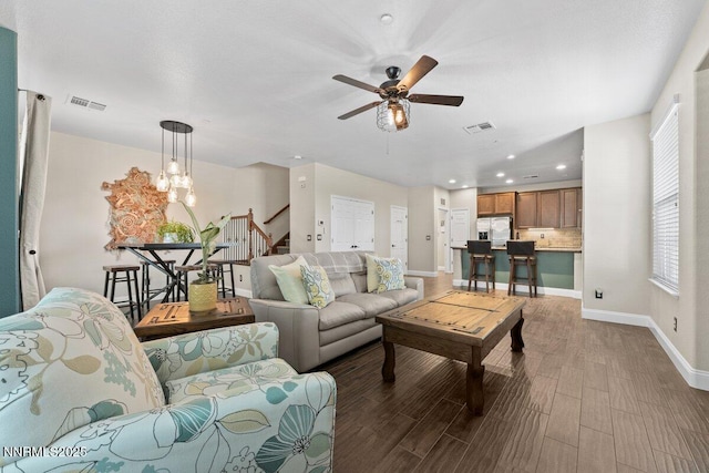 1955 Wind Ranch Rd Unit A, Reno, NV 89521 - living area featuring recessed lighting, baseboards, wood finished floors, stairs, and a ceiling fan