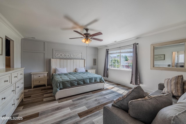 18105 Pasado Ct, Reno, NV 89508 - bedroom with crown molding, light wood finished floors, and ceiling fan