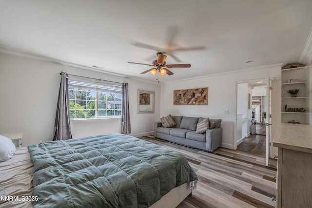 18105 Pasado Ct, Reno, NV 89508 - bedroom featuring crown molding, light wood finished floors, baseboards, and a ceiling fan