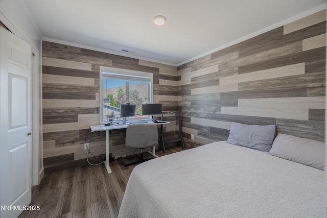 18105 Pasado Ct, Reno, NV 89508 - bedroom with wood walls, ornamental molding, a desk, and wood finished floors
