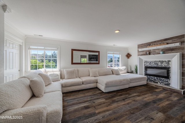18105 Pasado Ct, Reno, NV 89508 - living room with crown molding, dark wood-type flooring, recessed lighting, and a glass covered fireplace