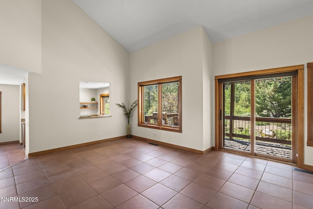 16460 Jefte Ct, Reno, NV 89511 - unfurnished room featuring high vaulted ceiling and tile patterned floors