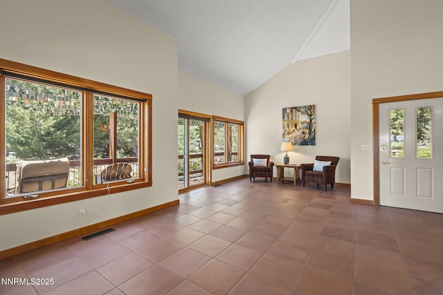 16460 Jefte Ct, Reno, NV 89511 - entrance foyer with high vaulted ceiling and tile patterned floors