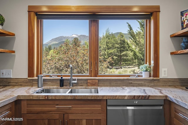 16460 Jefte Ct, Reno, NV 89511 - kitchen featuring stainless steel dishwasher, open shelves, a mountain view, and brown cabinets
