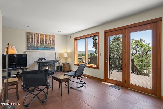 16460 Jefte Ct, Reno, NV 89511 - office area with a wood stove, tile patterned flooring, and recessed lighting