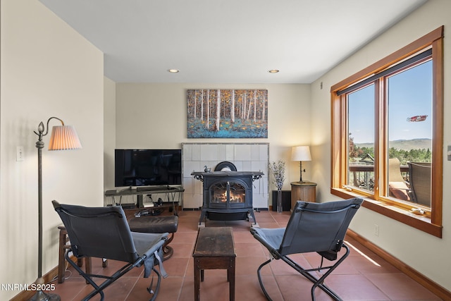 16460 Jefte Ct, Reno, NV 89511 - tiled living area with a wood stove and recessed lighting
