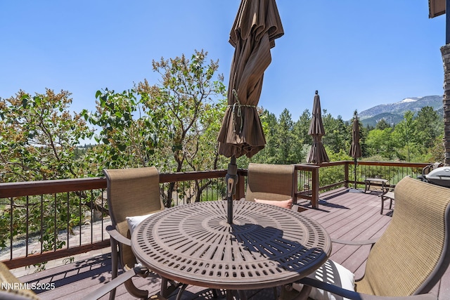 16460 Jefte Ct, Reno, NV 89511 - deck featuring a mountain view and outdoor dining space