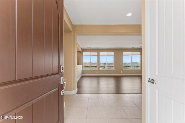 1080 S University Park Loop, Reno, NV 89512 - foyer featuring light tile patterned flooring, baseboards, and recessed lighting