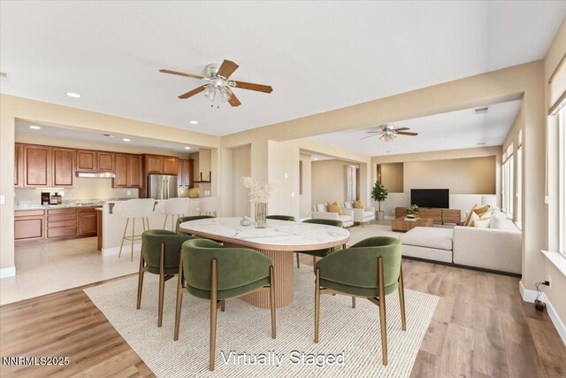 1080 S University Park Loop, Reno, NV 89512 - dining room with a ceiling fan, baseboards, light wood-style flooring, and recessed lighting