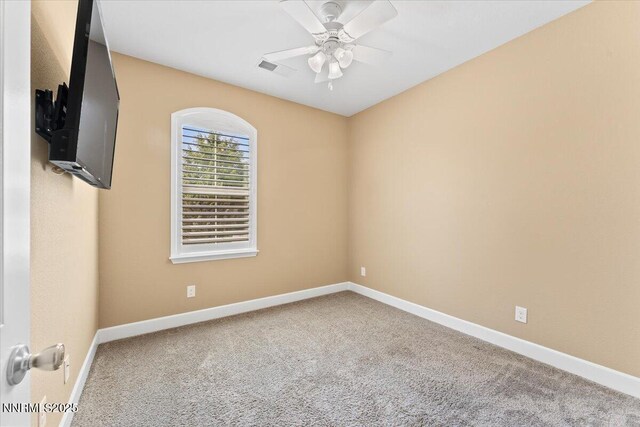1080 S University Park Loop, Reno, NV 89512 - carpeted spare room with ceiling fan and baseboards