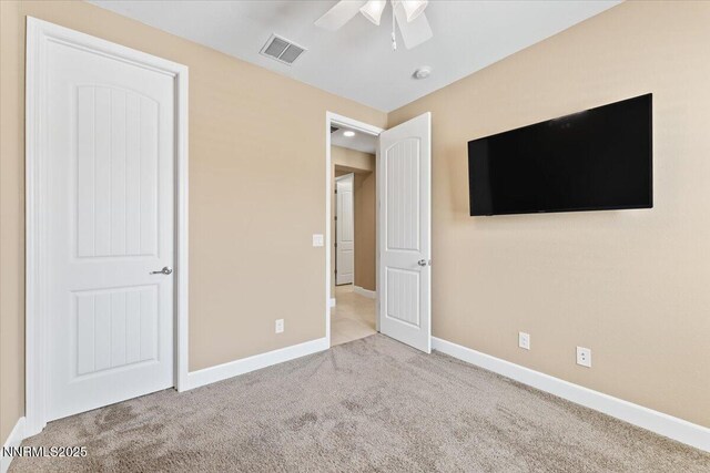 1080 S University Park Loop, Reno, NV 89512 - unfurnished bedroom featuring carpet flooring, baseboards, and ceiling fan